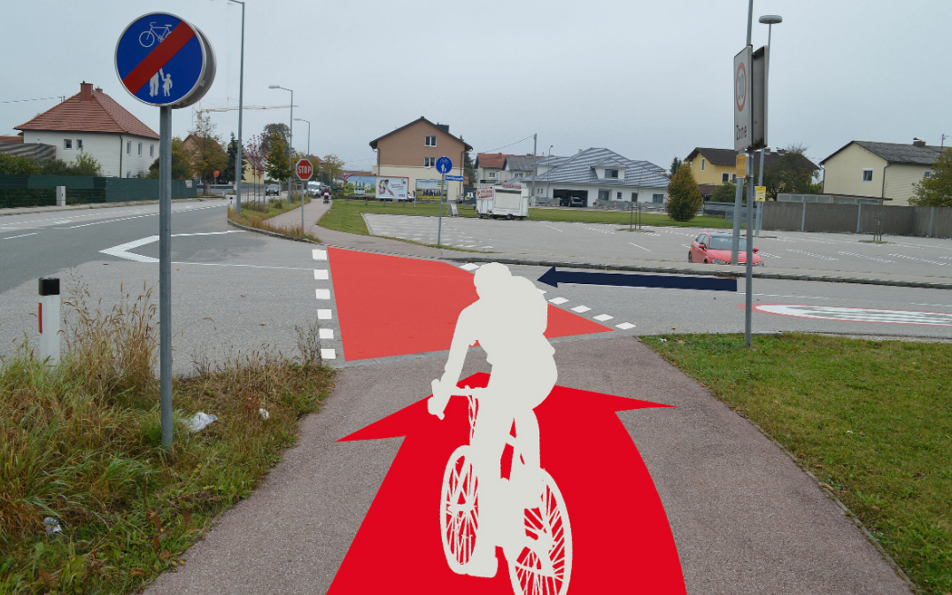 Grafik visualisiert Radfahrerüberfahrt mit roter flächiger Markierung